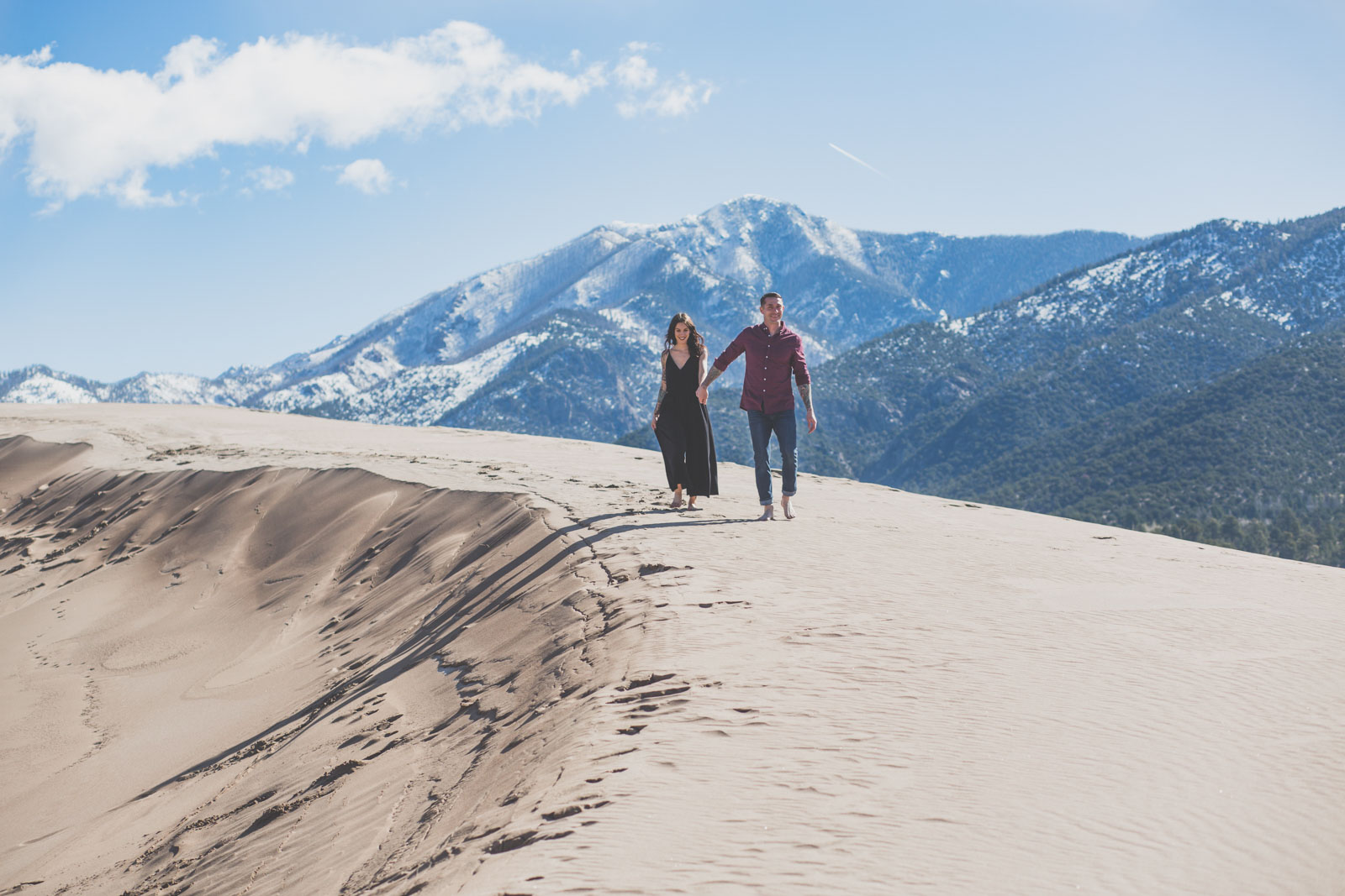snow capped mountain Engagement session - Great Sand Dunes National Park, CO